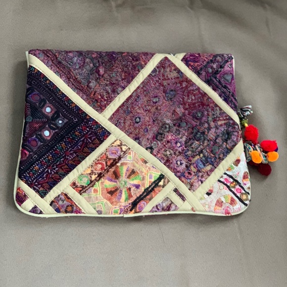 Antik Batik coin fabric clutch New